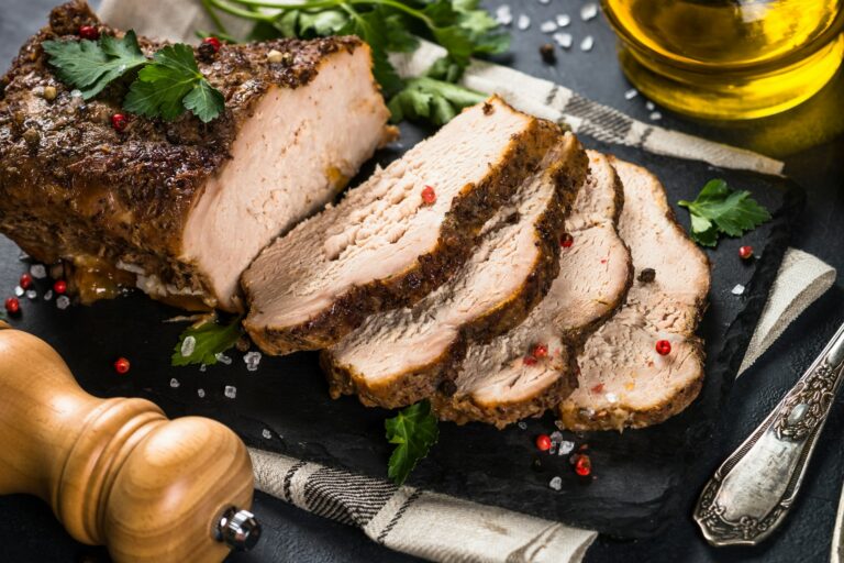 Baked pork meat ham on black