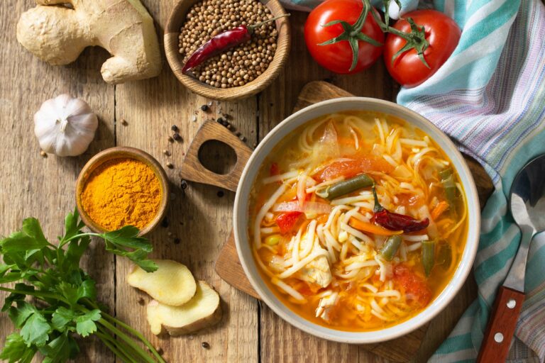 Tukpa soup of Indian cuisine. Hot noodle soup with chicken, ginger, cilantro and spices.